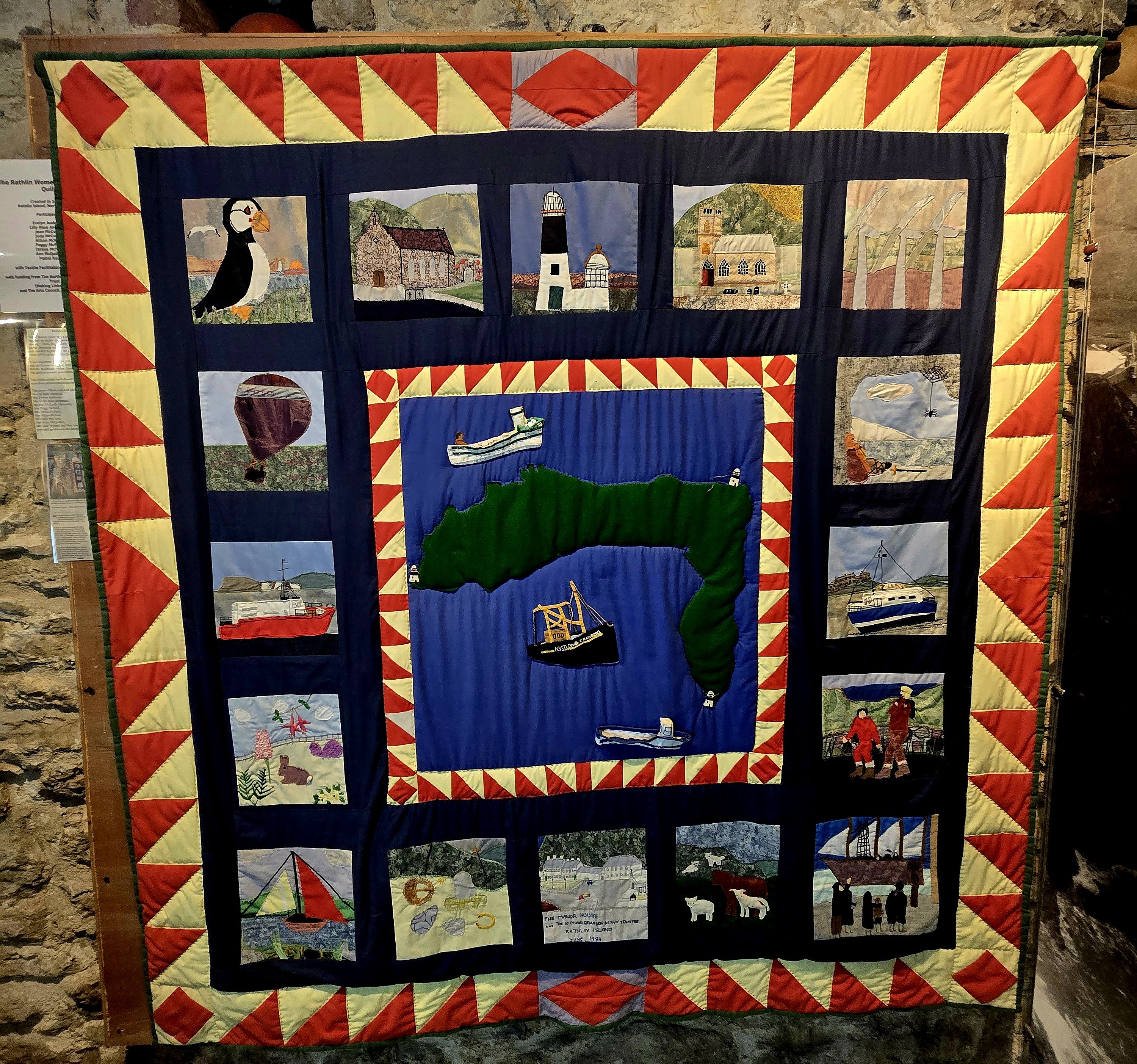 A quilt displaying muliple images of Rathlin